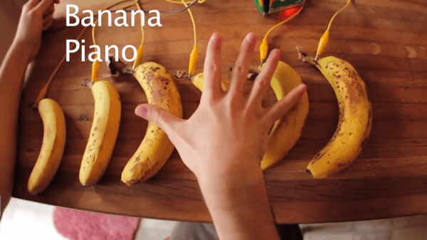 Controlling a banana piano using Makey Makey.